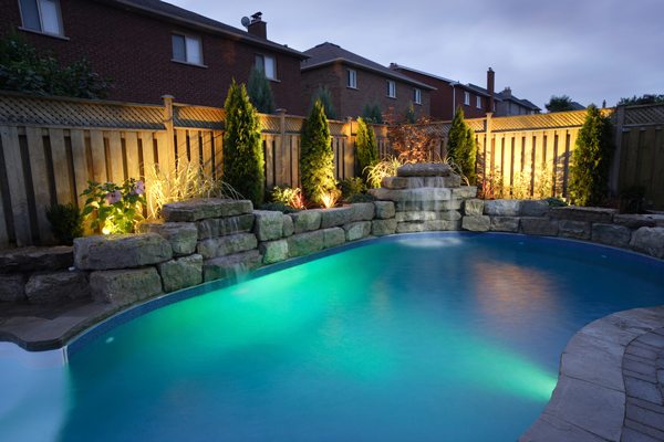 A Beautiful Swimming Pool and Landscaping in Backyard