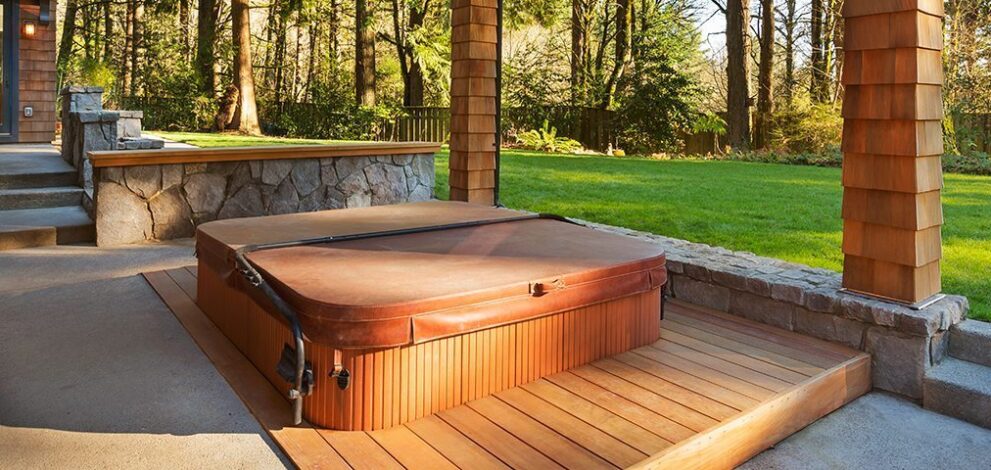 A outdoor hot tub in an amazing backyard