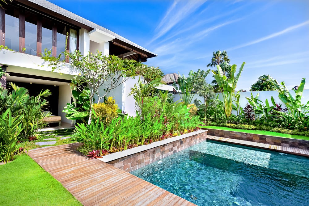Are you looking for a wallet friendly option to upgrade your pool this summer? Here's how to plant a poolside garden to elevate your backyard